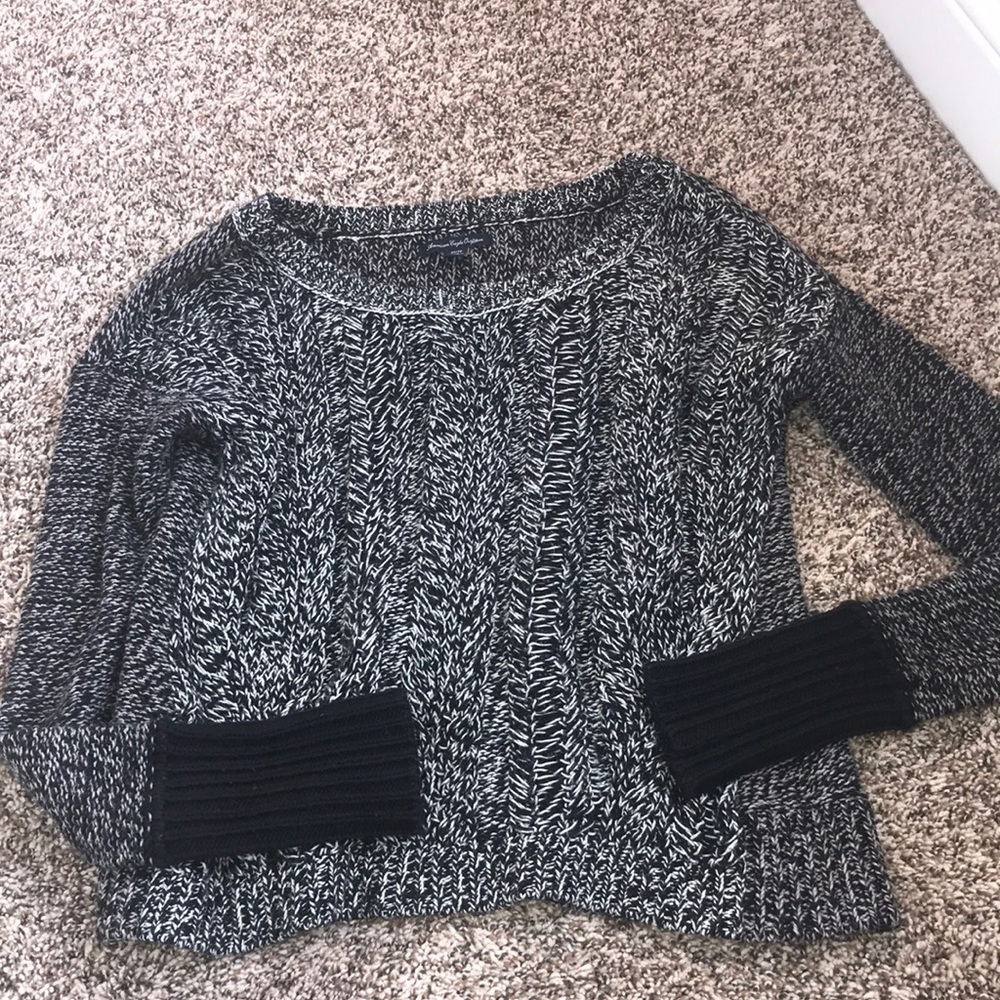 Woman’s Black and White knit sweater